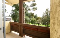 Top Floor Unit with Verdant Views